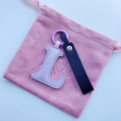 Брелок украшение на сумку Буква L сиреневая
